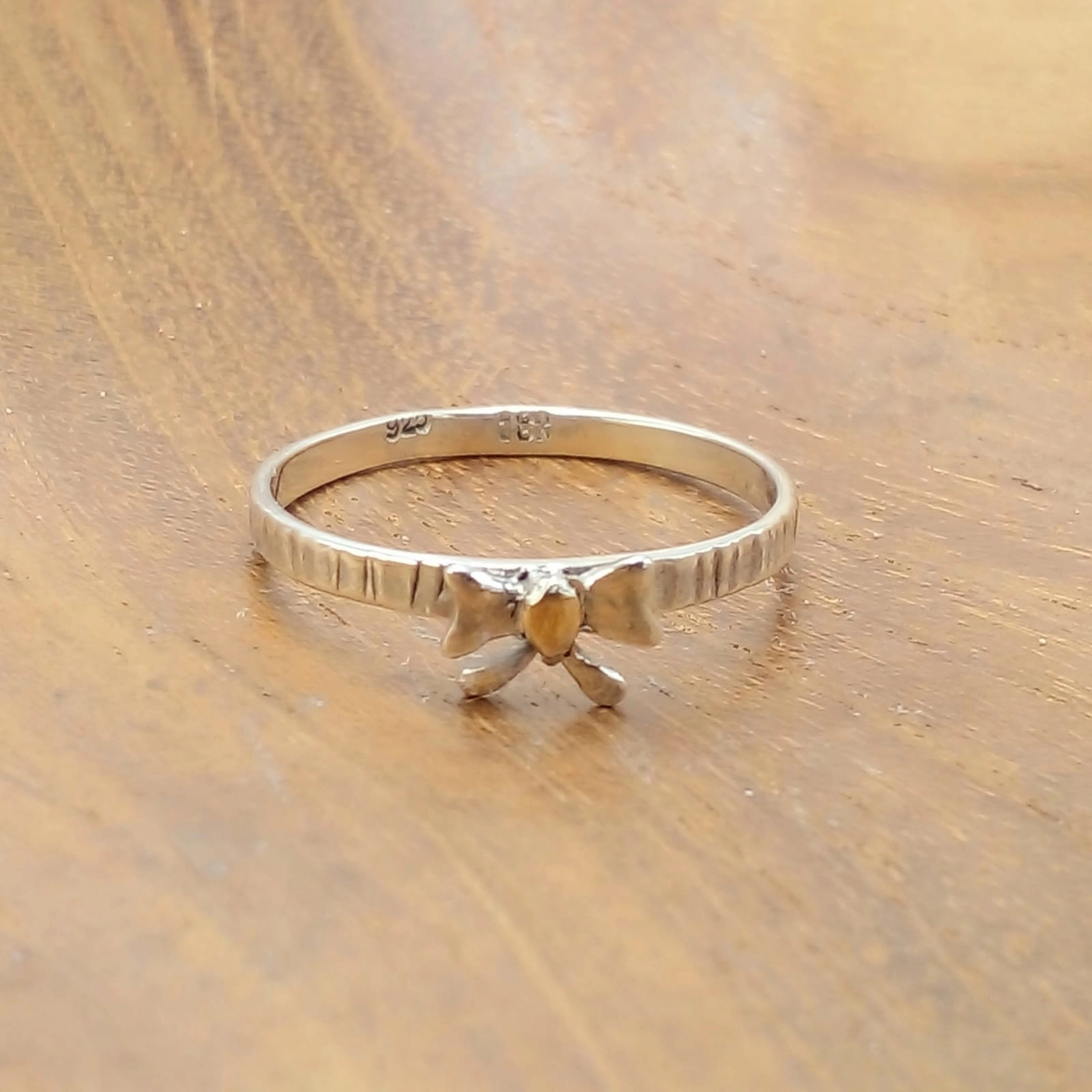 Genuine 925 Silver Ring with Gold-Accented Ribbon Design R708W115